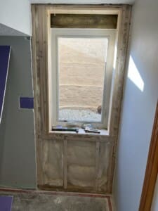Adding new drywall around a window